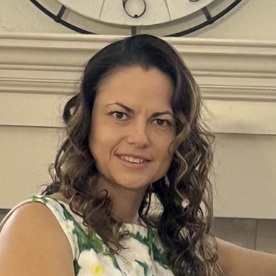 A headshot of Ana Cerean, the Practice Managerr at Eagle's Nest Eye Clinic.